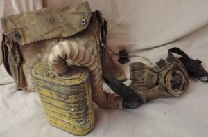 Clarence had to use his gas mask while in the trenches and "going over the top."